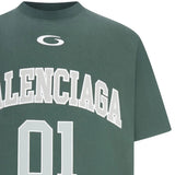 Close up of green t-shirt, showing texture of the cotton fabric