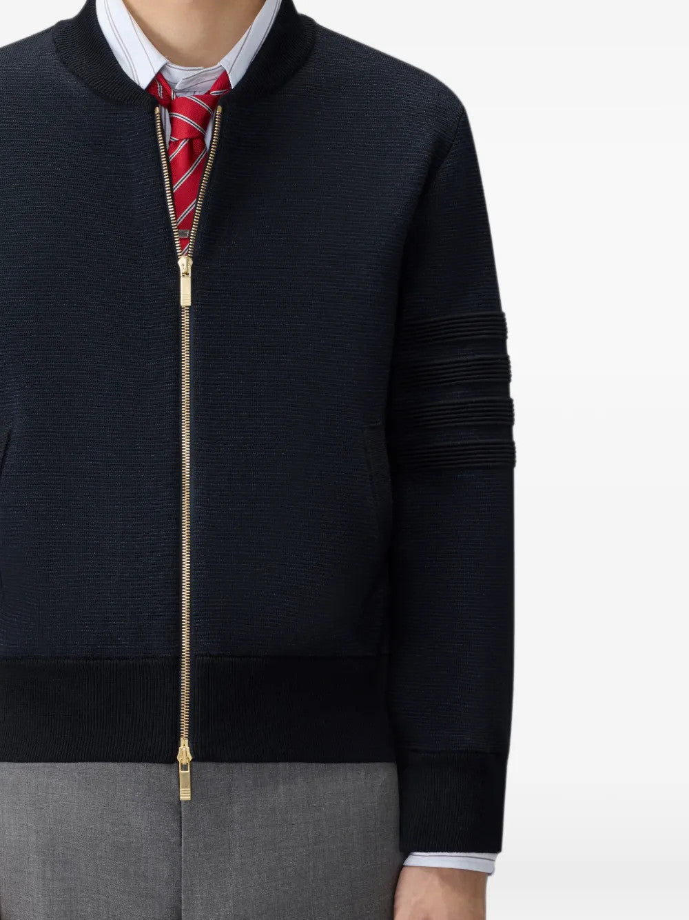 Navy jacket worn by a person, showing the jacket fit