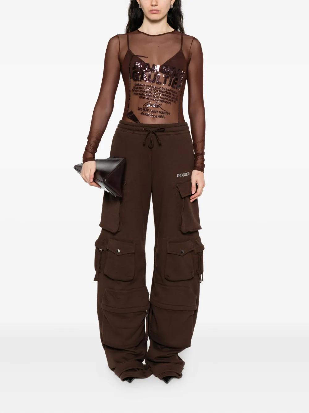 Red top, full body view