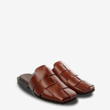 Tan mules, side view