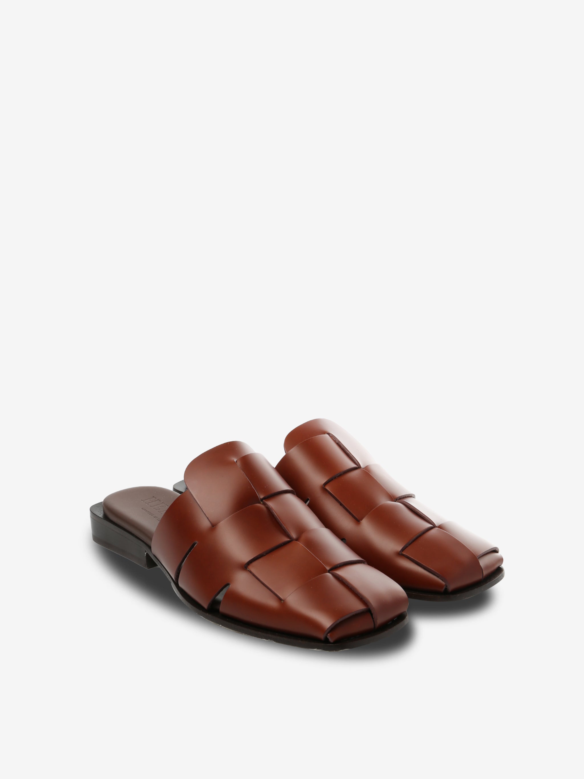 Tan mules, side view