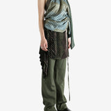 Green top, full body view