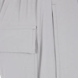 Close up of Grey pants, showing texture of the 53% fsc viscose/ 47% acetate made in fabric