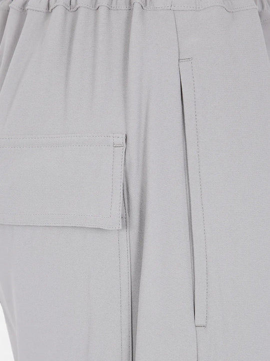 Close up of Grey pants, showing texture of the 53% fsc viscose/ 47% acetate made in fabric