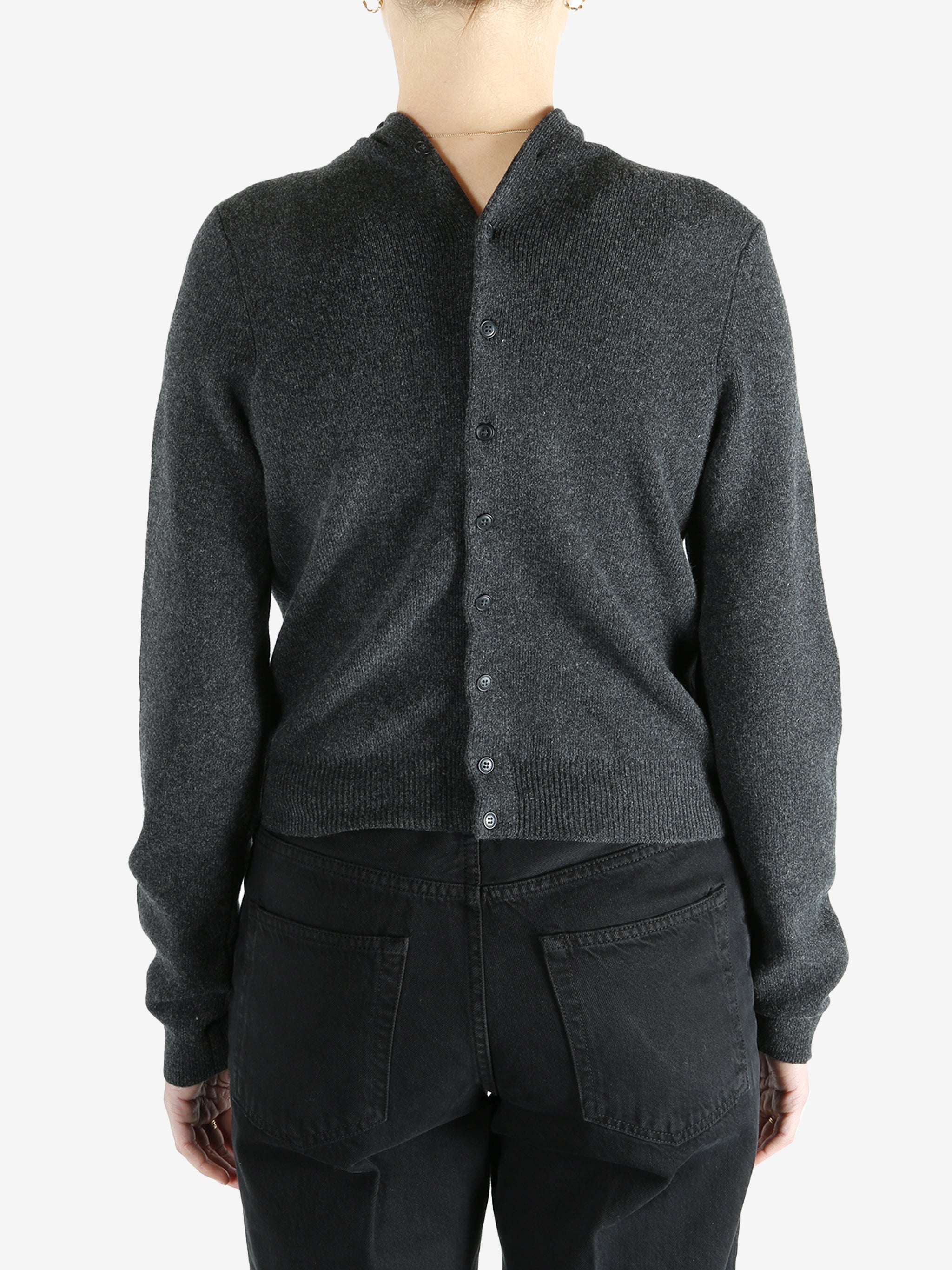 Grey cardigan worn by a person, showing the cardigan fit