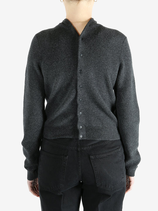 Grey cardigan worn by a person, showing the cardigan fit