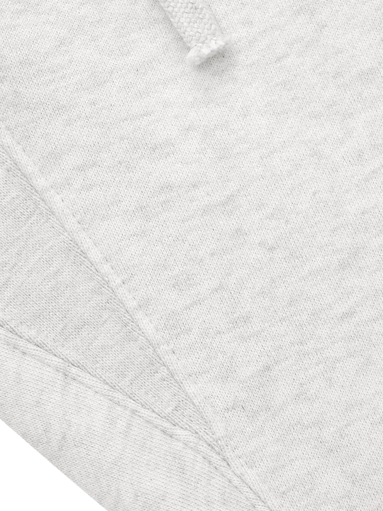 Close up of white pants, showing texture of the Cotton and Polyester fabric