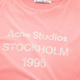 Close up of Pink t-shirt, showing texture of the 100% cotton fabric