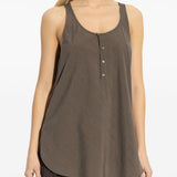 Brown top worn by a person, showing the top fit