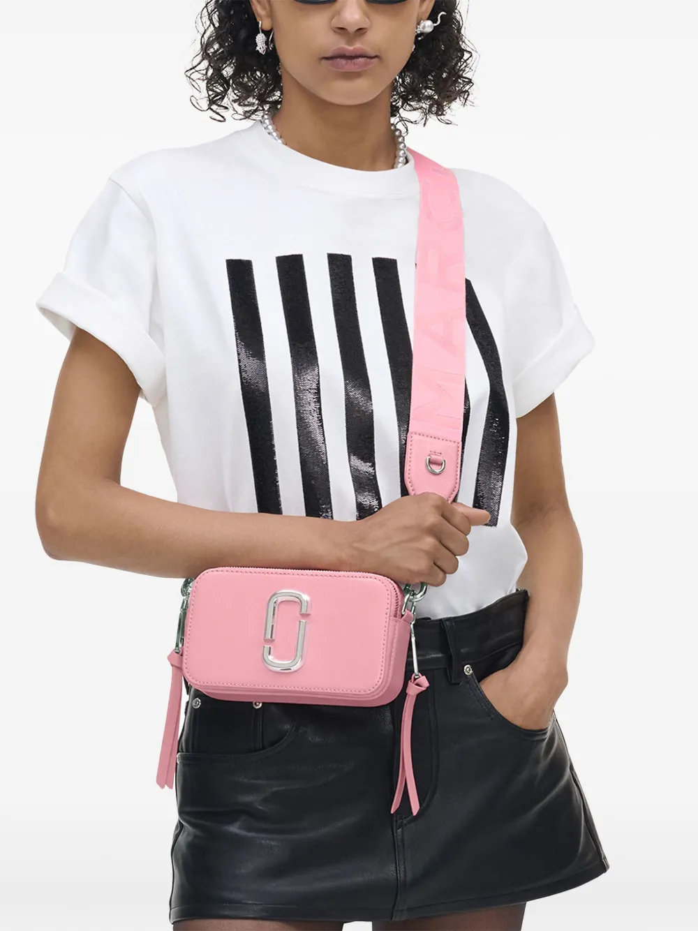 pink bags worn by a person, showing the bags fit