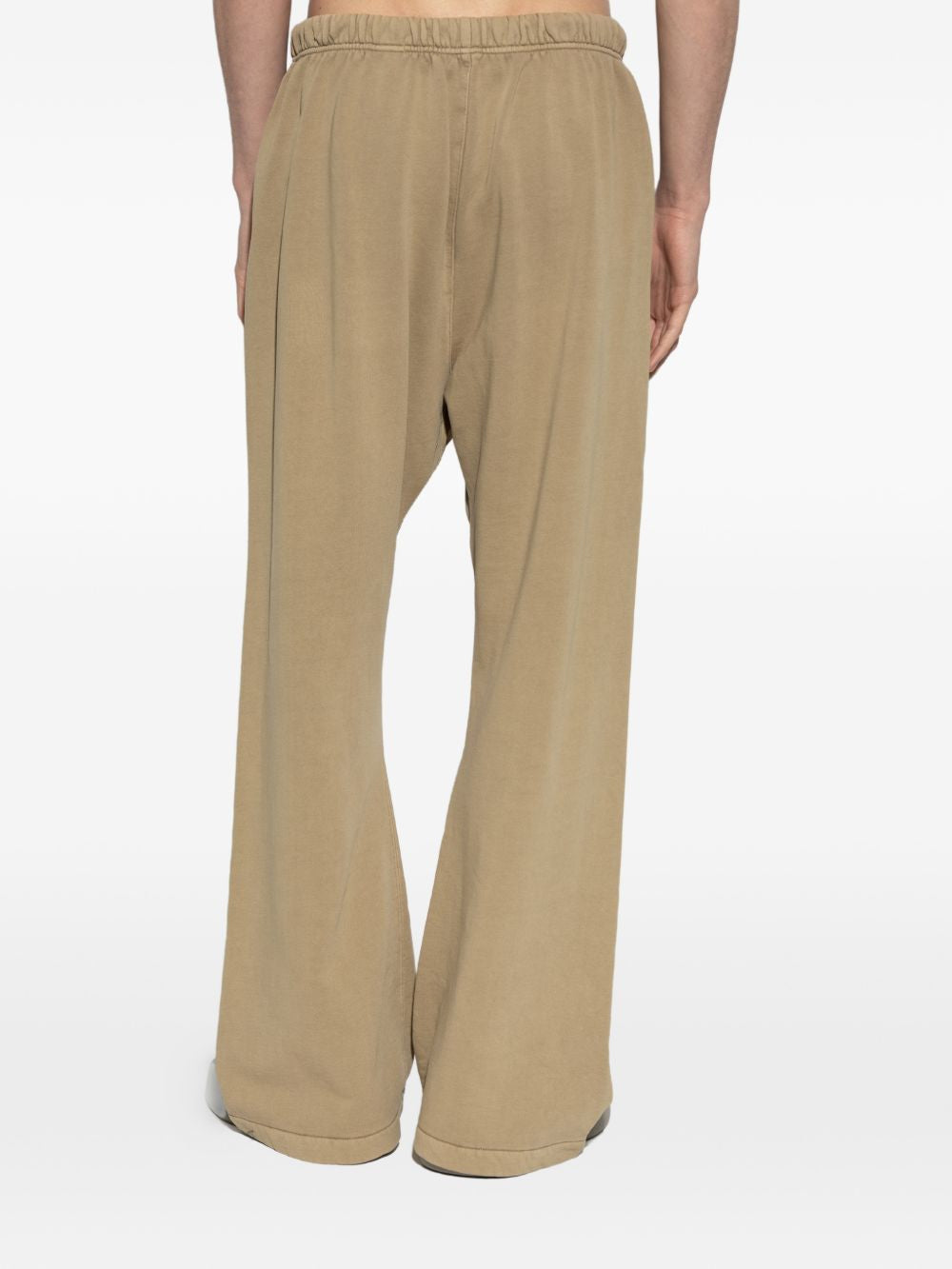 Tan pants worn by a person, showing the pants' fit