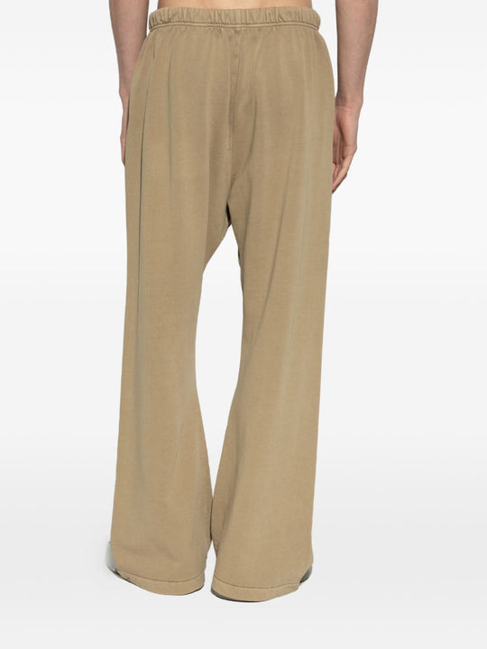 Tan pants worn by a person, showing the pants' fit
