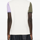 White shirt worn by a person, showing the cotton fit