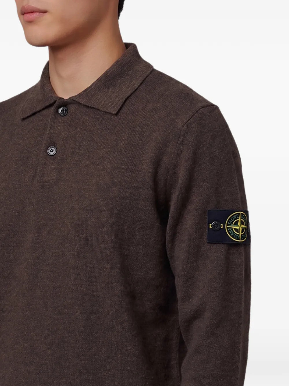 Brown top worn by a person, showing the top fit