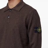 Brown top worn by a person, showing the top fit