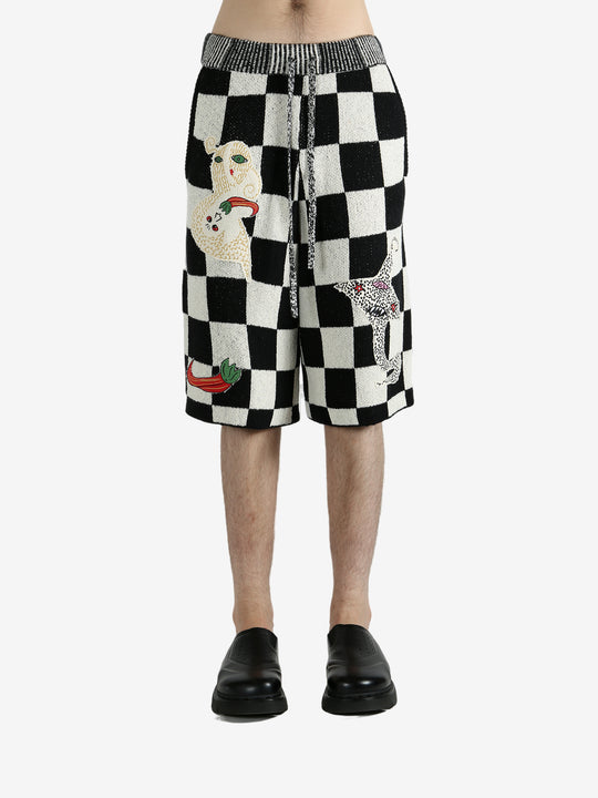 Black shorts worn by a person, showing the shorts’ fit