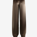Brown pants worn by a person, showing the pants's fit