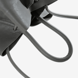 Close up of grey bag, showing texture of the fabric
