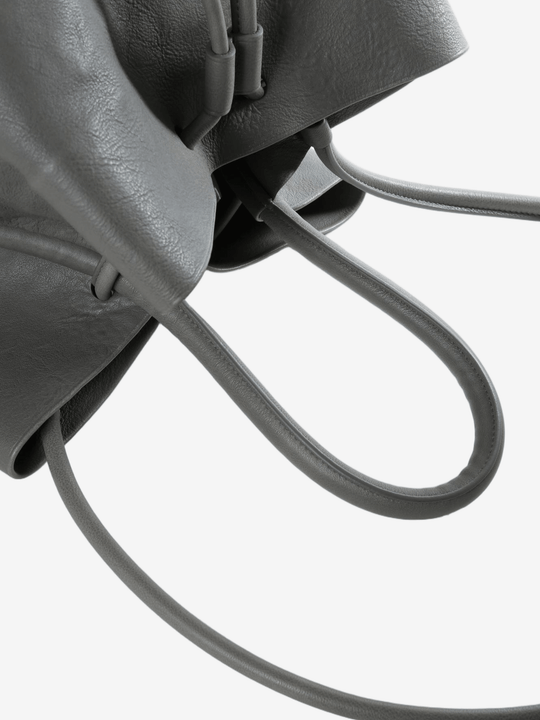 Close up of grey bag, showing texture of the fabric