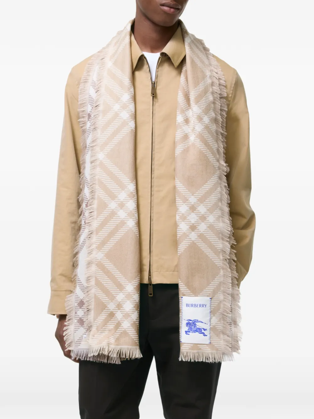 Brown scarf worn by a person, showing the scarf fit