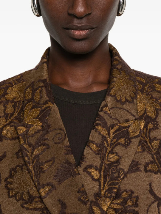 Brown jacket worn by a person, showing the jacket fit