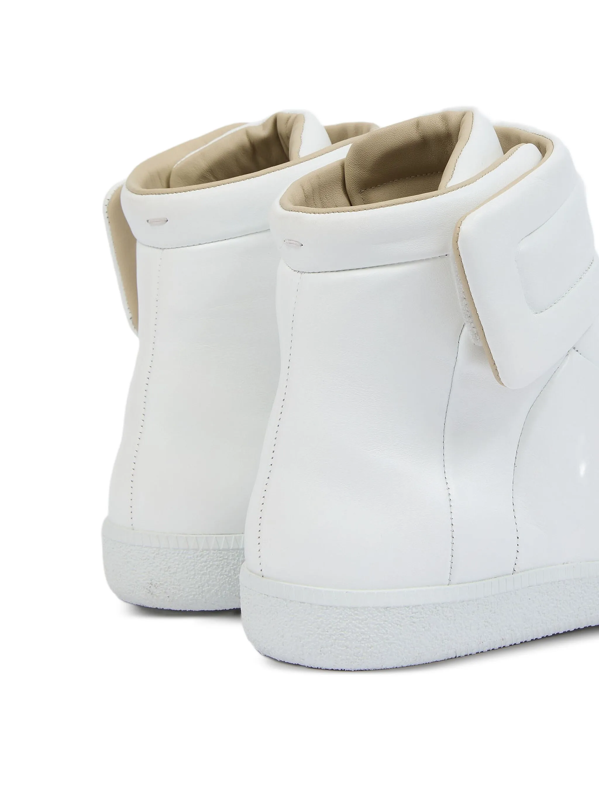 Close up of white sneakers, showing texture of the Calf Leather fabric