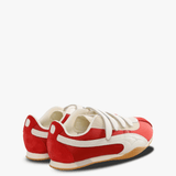 Orange sneakers, side view