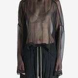 Black top worn by a person, showing the top's fit