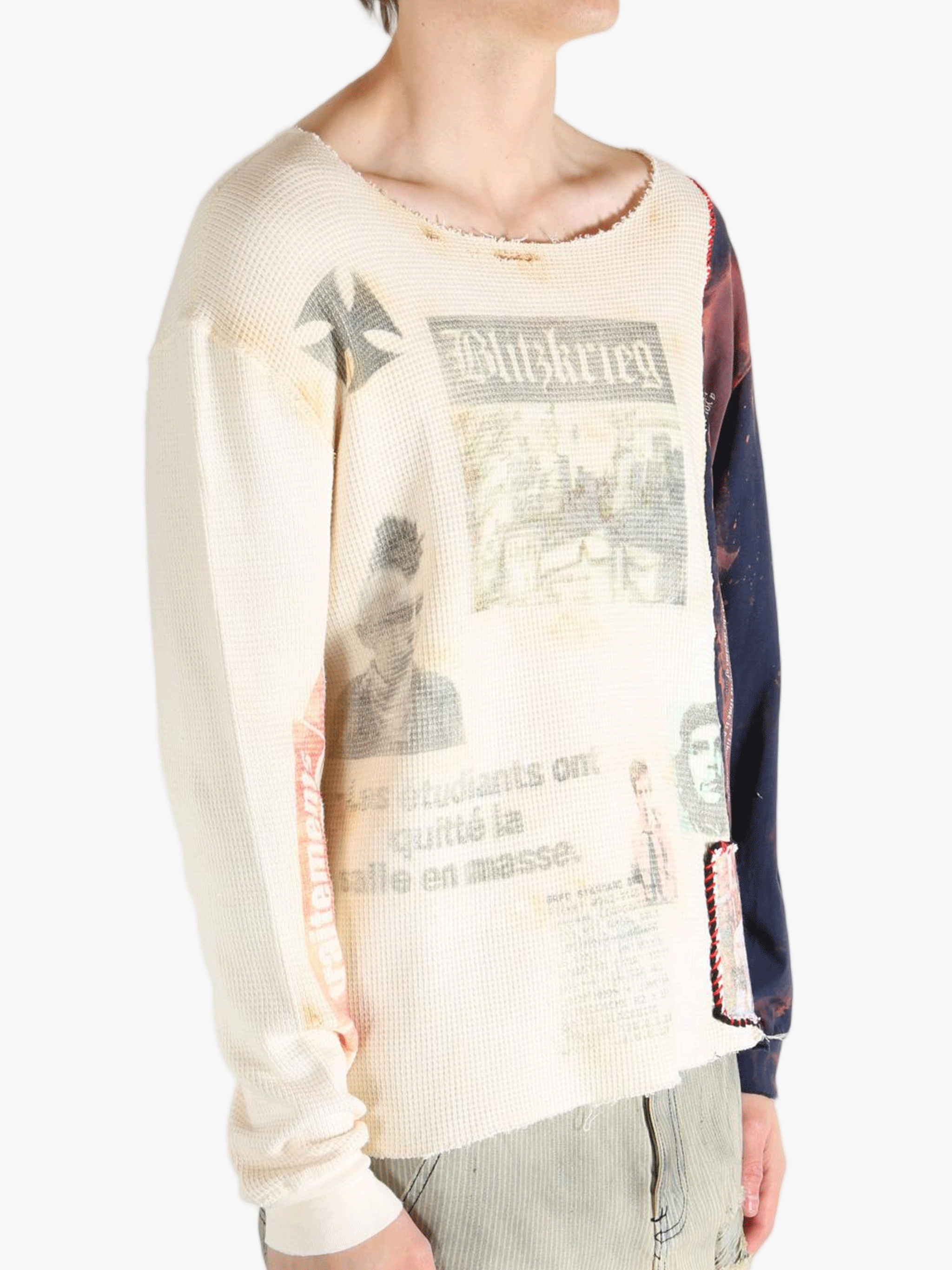 White knitwear worn by a person, showing the knitwear fit