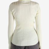 White shirt worn by a person, showing the shirt's fit