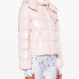 Pink jackets worn by a person, showing the jackets fit