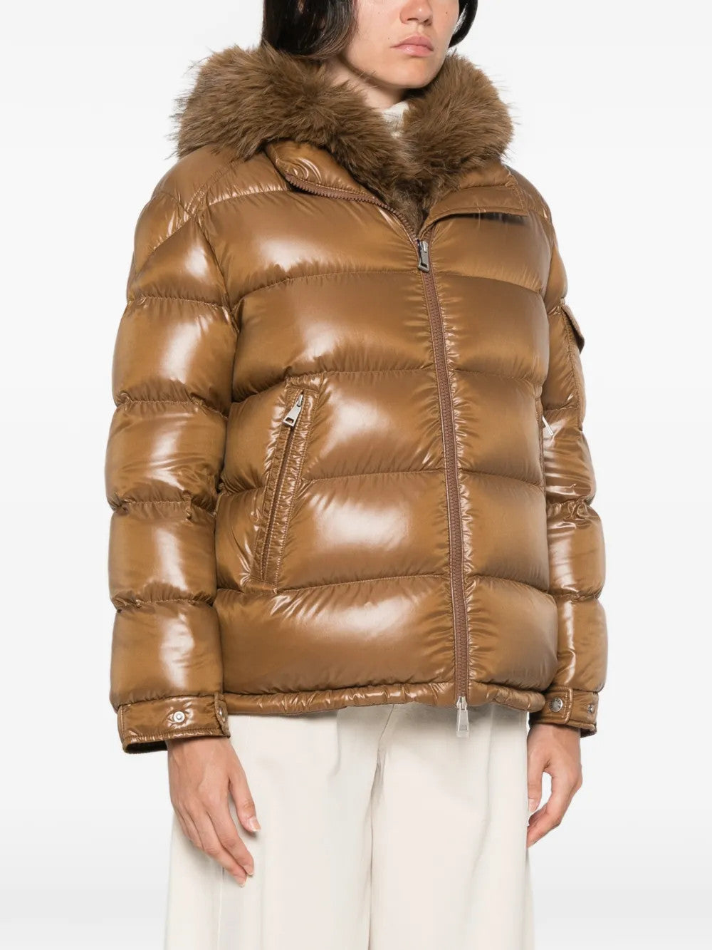 Brown jacket worn by a person, showing the jacket fit