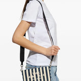 Blue bag worn by a person, showing the bag's fit