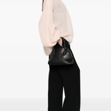 Pink cardigan, side view