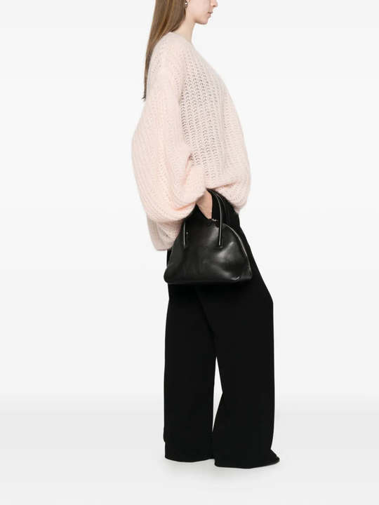 Pink cardigan, side view