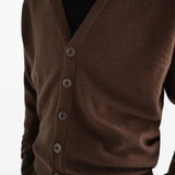 Brown knitwear worn by a person, showing the knitwear fit
