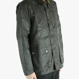 Green jacket worn by a person, showing the jacket's fit