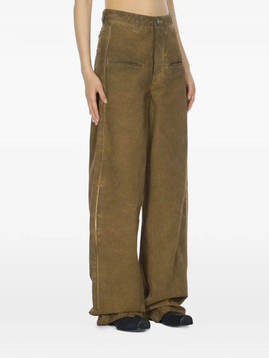Brown pants worn by a person, showing the pants fit