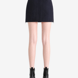 Black skirt worn by a person, showing the skirt fit