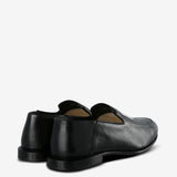 Black loafer, back view