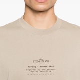 Close up of tan t-shirt, showing thetexture of the cotton fabric