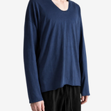 Navy top worn by a person, showing the top fit