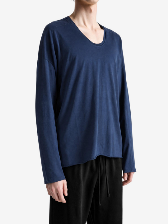 Navy top worn by a person, showing the top fit