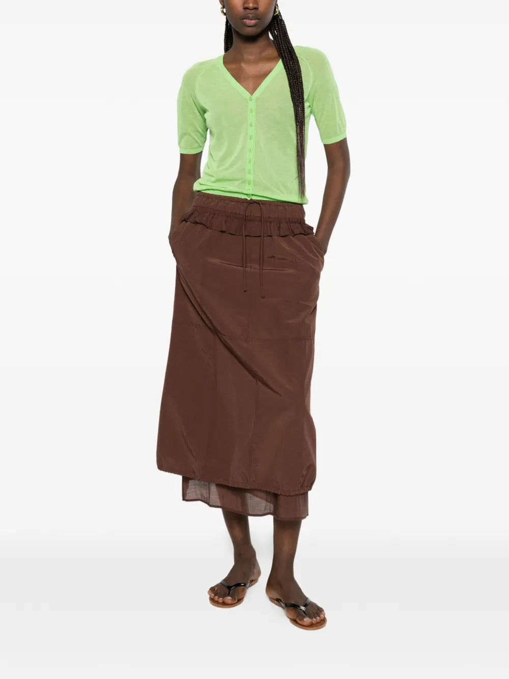 Green top, full body view