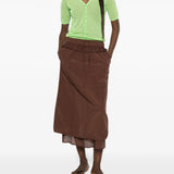 Green top, full body view