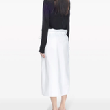 Black top worn by a person, showing the top's fit