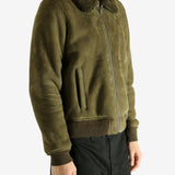 Green jacket worn by a person, showing the jacket's fit