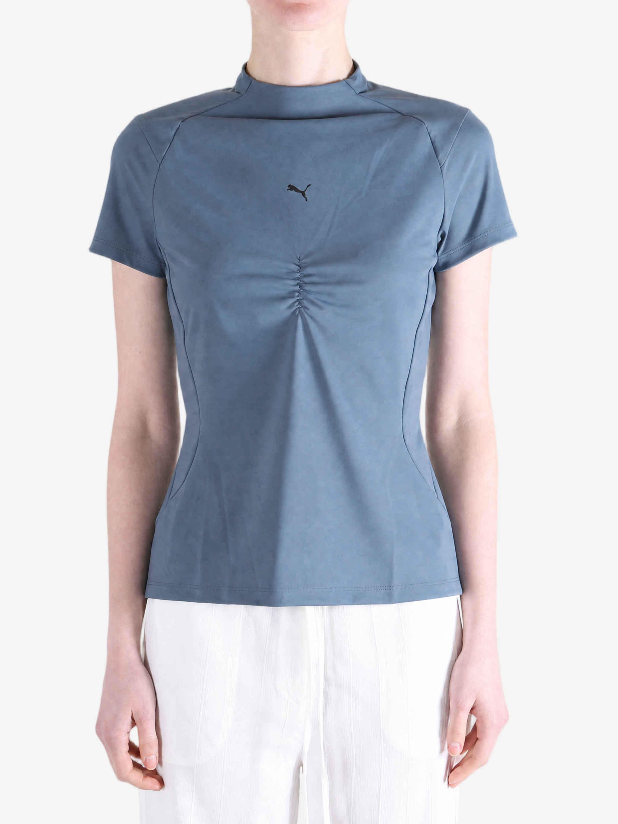 Blue top worn by a person, showing the top fit