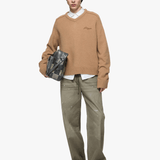 Green jeans, full body view