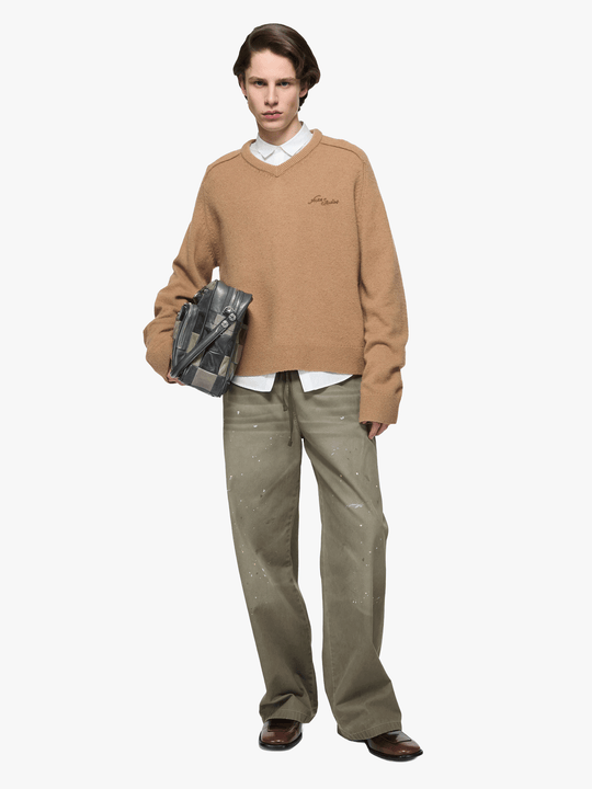 Green jeans, full body view